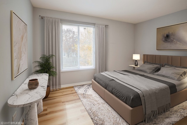 bedroom featuring light hardwood / wood-style flooring