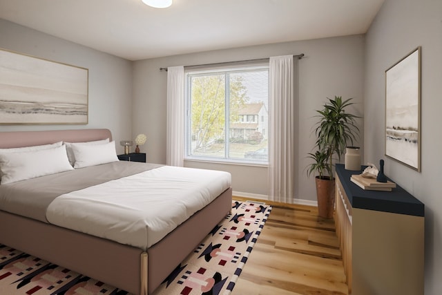 bedroom featuring light hardwood / wood-style flooring