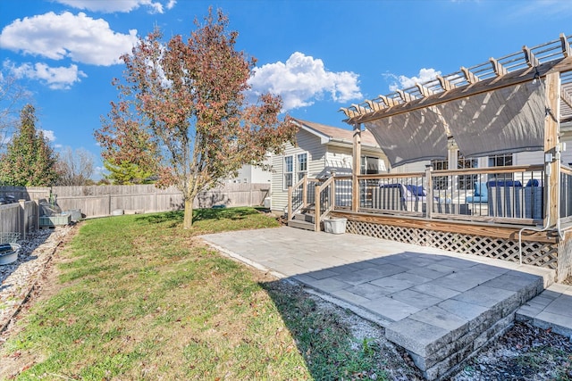 view of yard featuring a pergola, a patio, and a deck