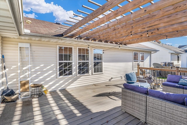 wooden deck featuring an outdoor hangout area