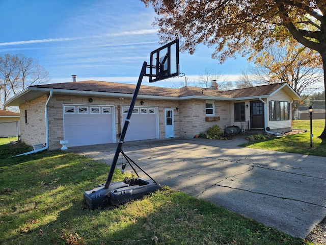 single story home with a front lawn and a garage