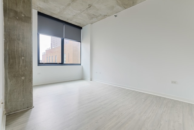 empty room featuring light hardwood / wood-style floors