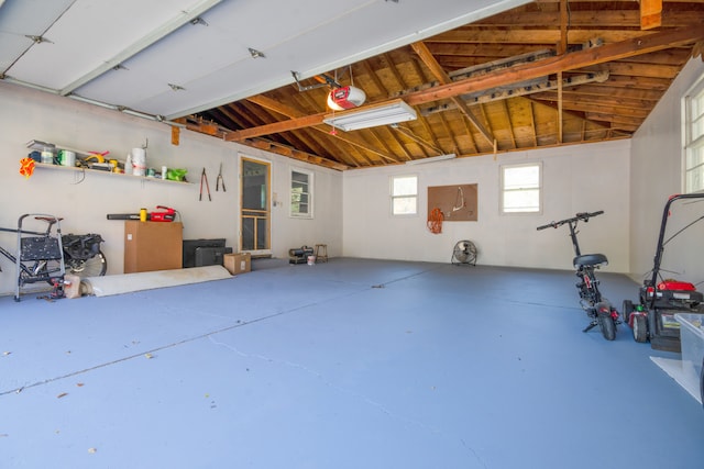 garage featuring a garage door opener