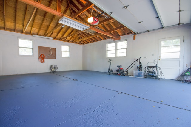 garage featuring a garage door opener