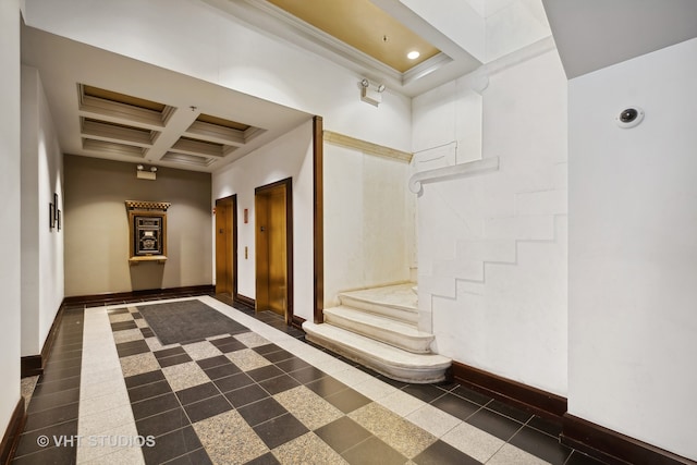 corridor with elevator, beam ceiling, crown molding, and coffered ceiling