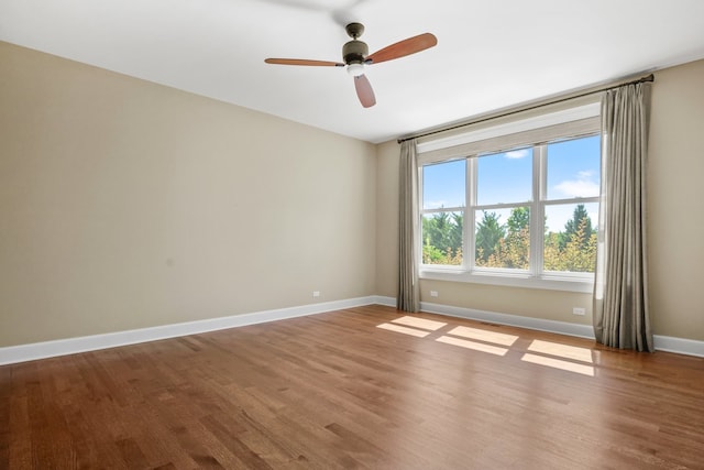 unfurnished room with ceiling fan and light hardwood / wood-style flooring