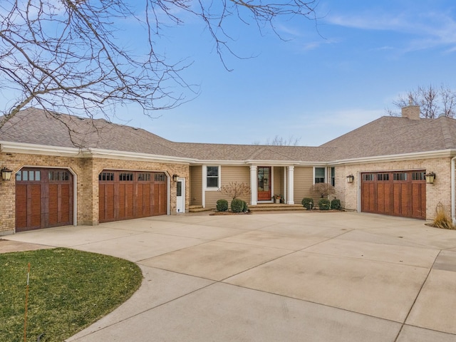 single story home featuring a garage