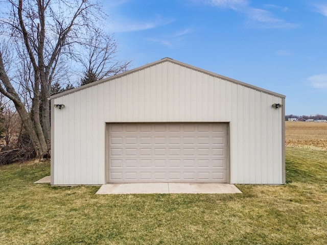 garage with a lawn