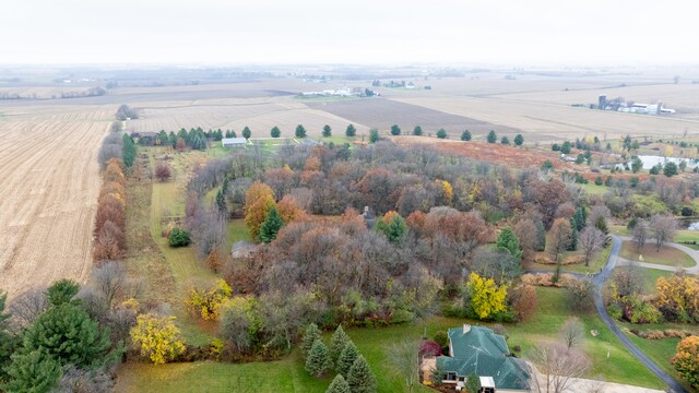 birds eye view of property featuring a rural view