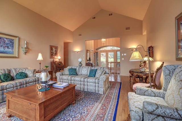 17619 Grandview Dr, Sterling, IL 61081 - living area with hardwood / wood-style flooring, high vaulted ceiling, and french doors