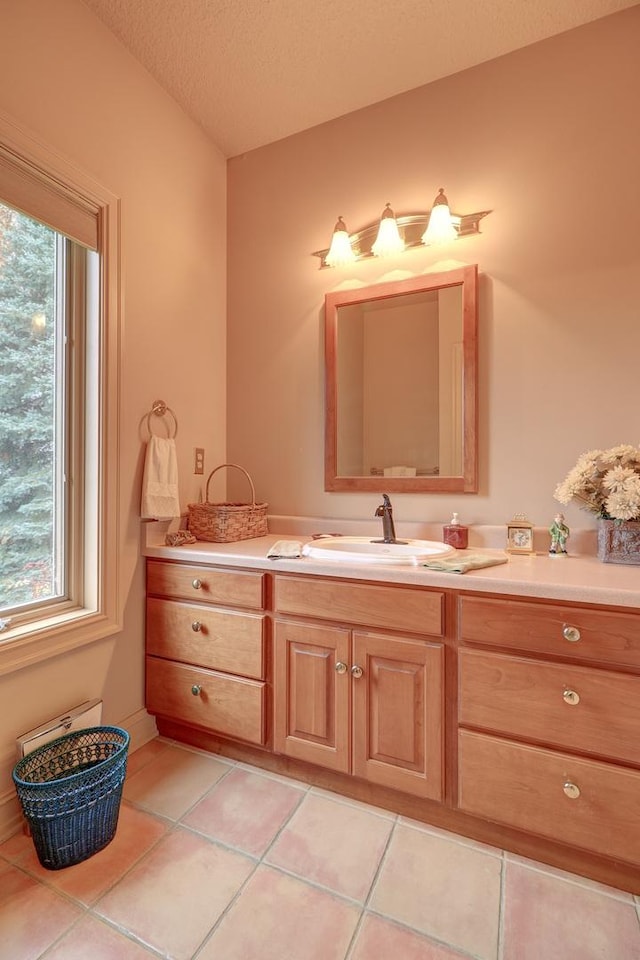 17619 Grandview Dr, Sterling, IL 61081 - bathroom featuring vanity, tile patterned flooring, and a textured ceiling
