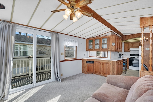 kitchen with light carpet, ceiling fan, kitchen peninsula, white stove, and lofted ceiling with beams