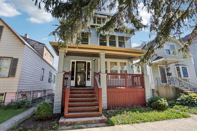 traditional style home featuring covered porch