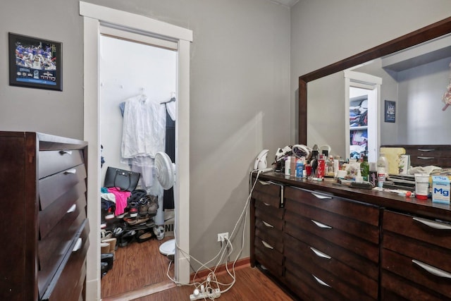 bedroom featuring wood finished floors