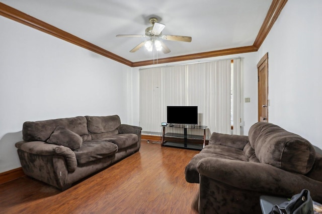 living room with a ceiling fan, wood finished floors, and ornamental molding