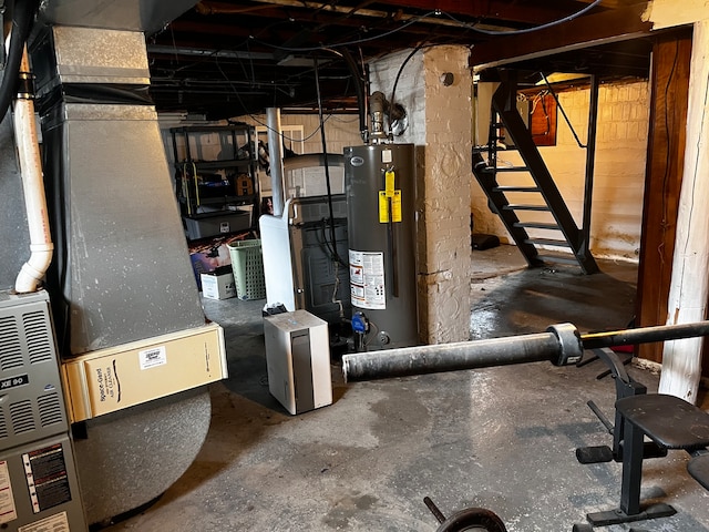 utility room featuring water heater