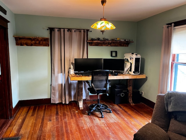 office area with hardwood / wood-style floors