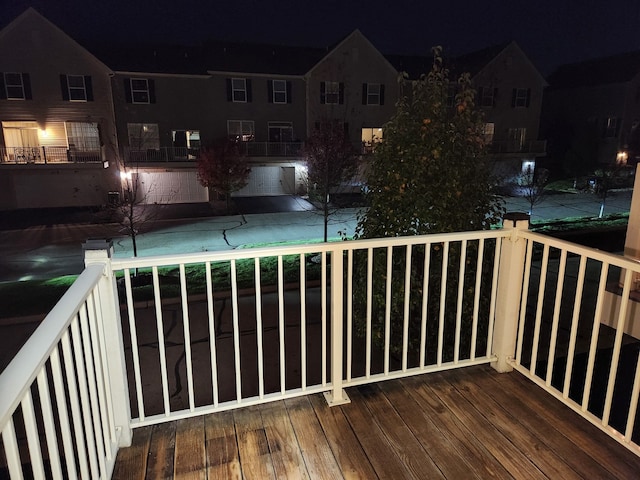 view of balcony at twilight