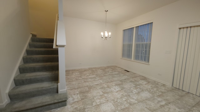 interior space featuring an inviting chandelier