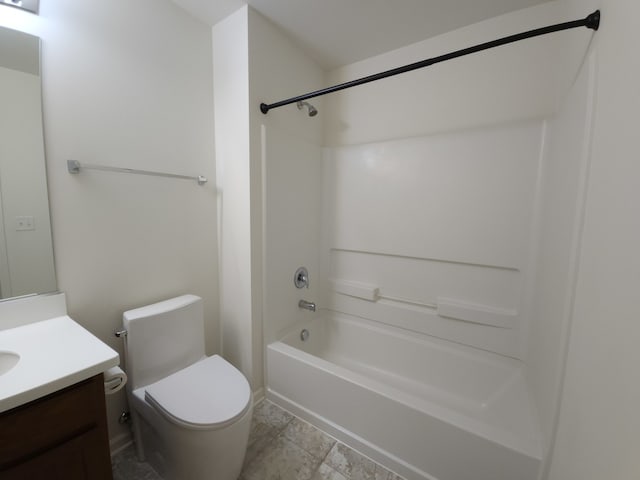 full bathroom with washtub / shower combination, tile patterned flooring, vanity, and toilet