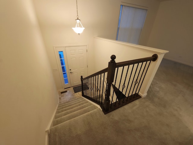 stairs with carpet floors