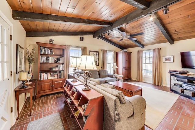 living room featuring lofted ceiling with beams, brick floor, and wooden ceiling