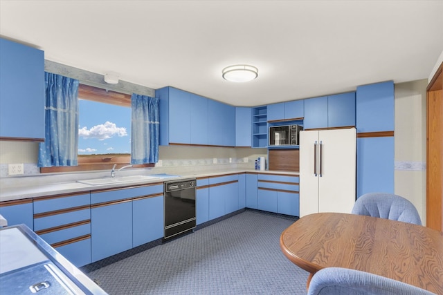 kitchen with black appliances, sink, and blue cabinets