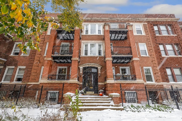 view of snow covered property