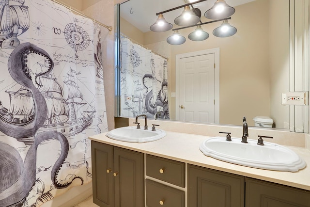 full bathroom featuring vanity, toilet, and shower / bath combo with shower curtain