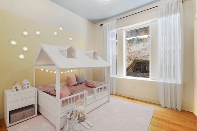 bedroom with light hardwood / wood-style flooring