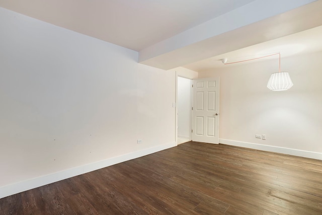 spare room with hardwood / wood-style floors