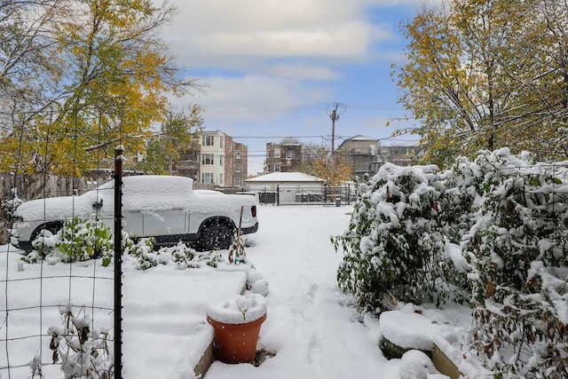 view of yard covered in snow