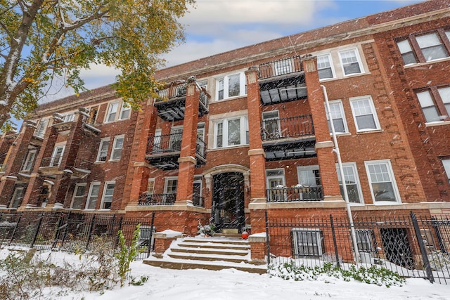 view of snow covered property