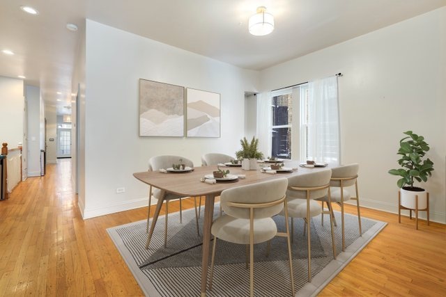 dining area with light hardwood / wood-style flooring