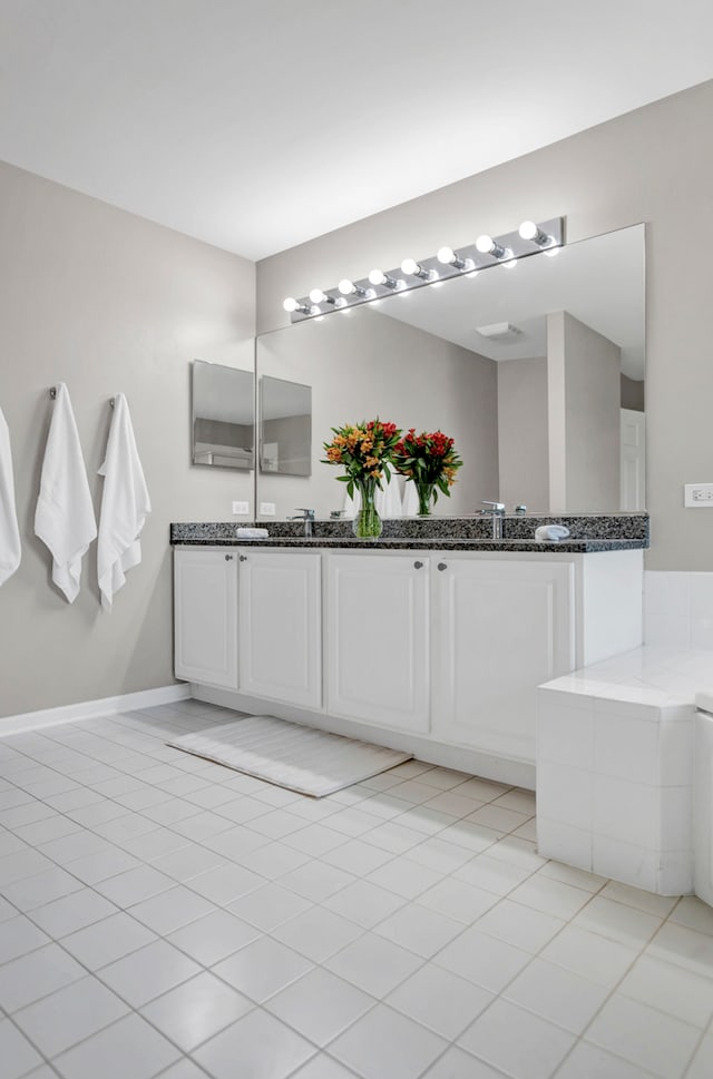 bathroom featuring vanity and tile patterned floors