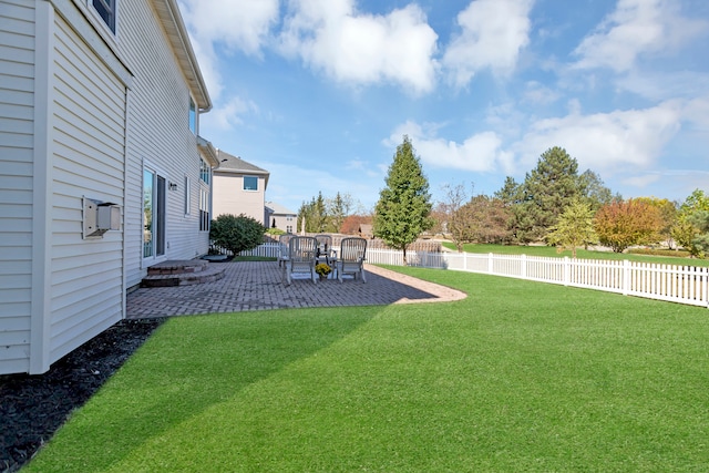 view of yard with a patio area