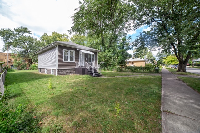 exterior space with a front lawn