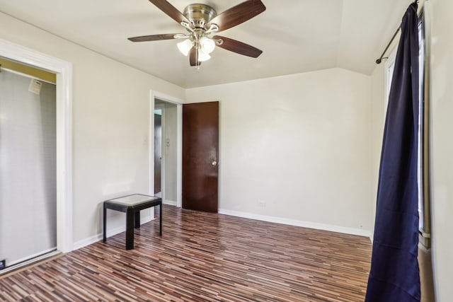 bedroom featuring ceiling fan and dark hardwood / wood-style flooring