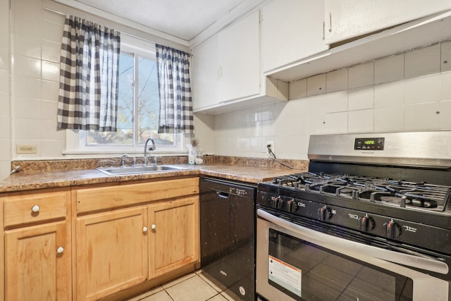 kitchen featuring stainless steel gas range oven, crown molding, sink, light tile patterned floors, and dishwasher