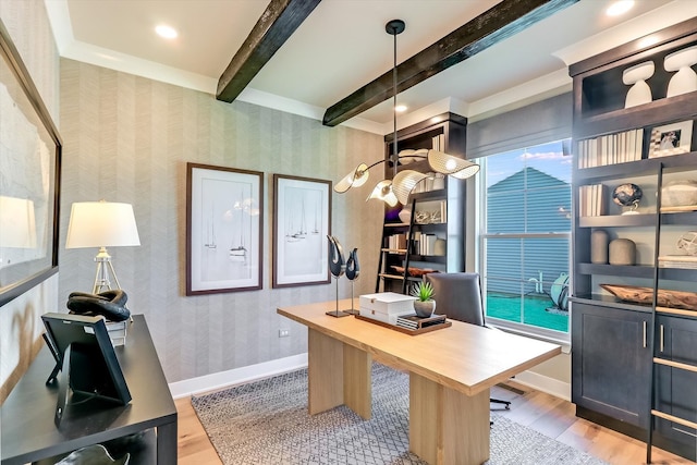 office with light wood-type flooring and beam ceiling