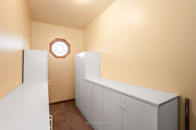 interior space featuring light colored carpet