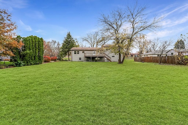 view of yard featuring a deck