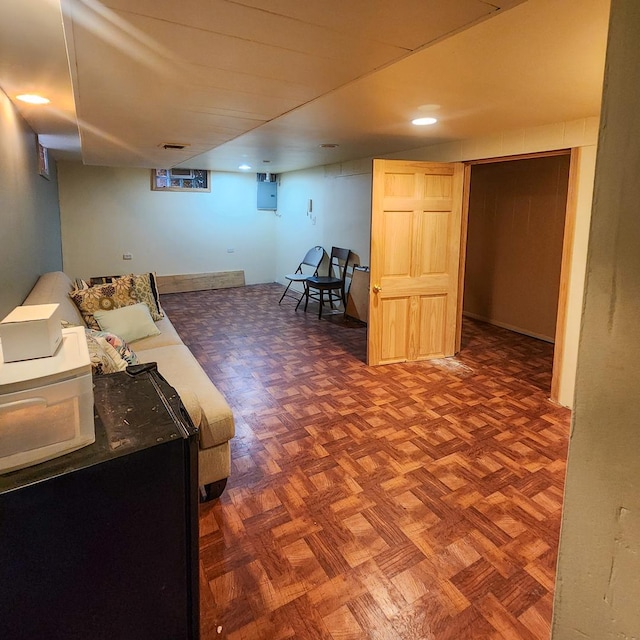 basement featuring parquet floors