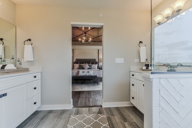 bathroom featuring hardwood / wood-style floors and vanity