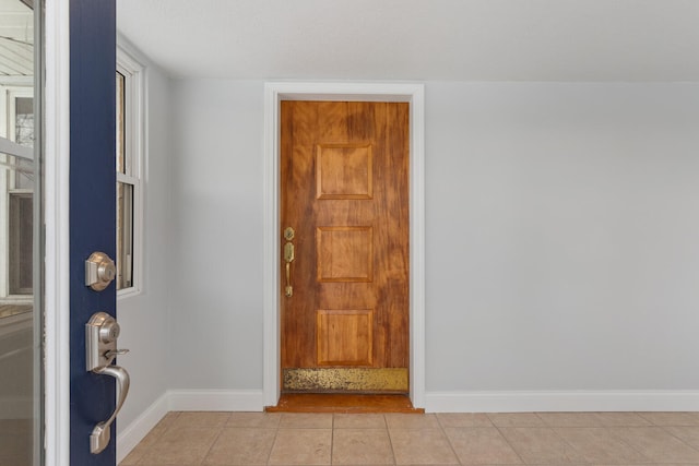 view of tiled foyer entrance