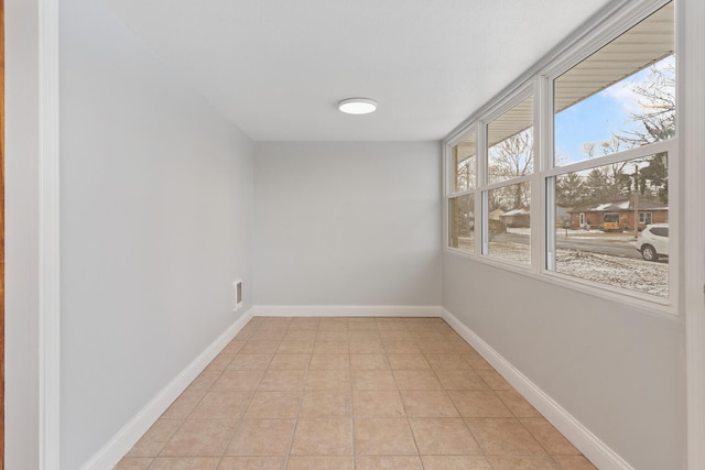 view of tiled spare room