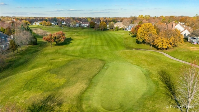 birds eye view of property featuring golf course view