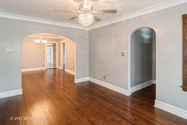 empty room with ceiling fan, dark hardwood / wood-style floors, and ornamental molding