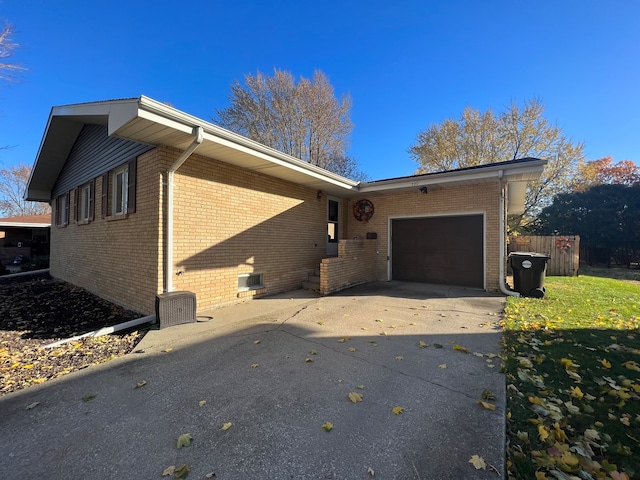 single story home featuring a garage