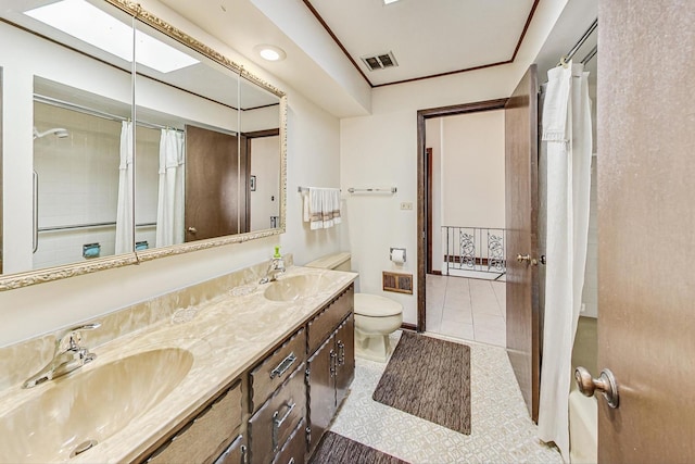 bathroom featuring a shower with curtain, tile patterned flooring, vanity, and toilet